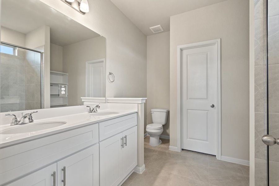 Furnished interior view inside a new home in Crosswinds, Kyle (Image 5).