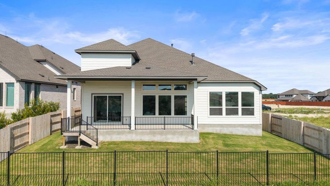 Exterior details and patio area of a home in Lariat, Liberty Hill (Image 26).