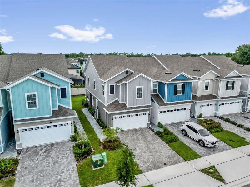 Front exterior of a new home in Brixton, St. Cloud, FL, highlighting curb appeal (Image 1). Front exterior of a new home in Brixton, St. Cloud, FL, highlighting curb appeal (Image 1).