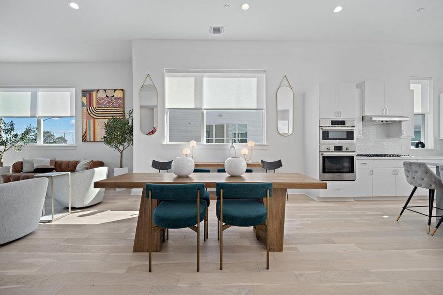 Dining area featuring recessed lighting and light wood-style floors