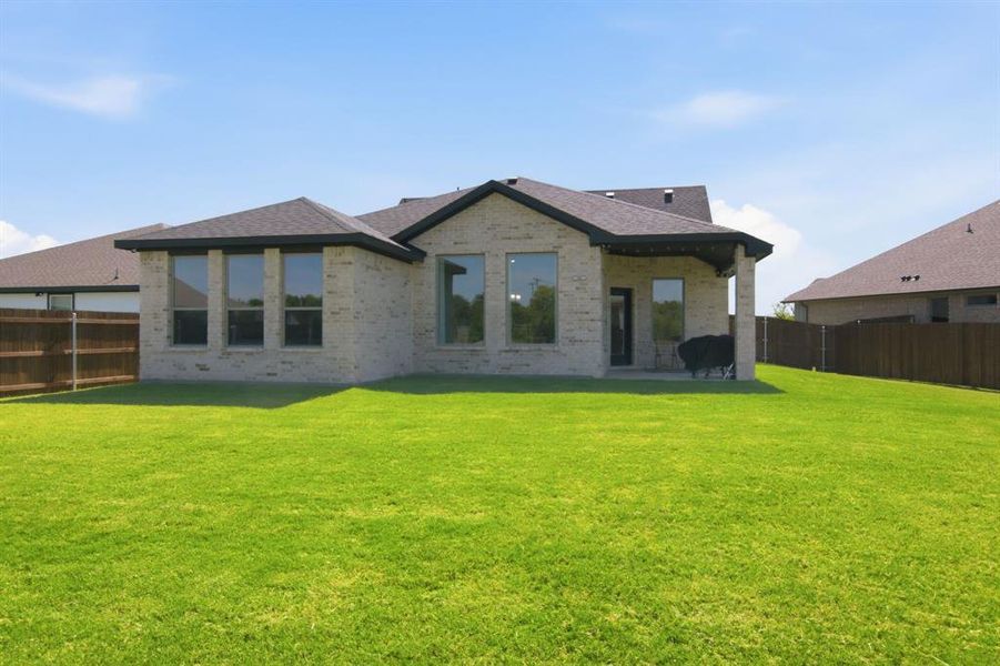 Exterior details and patio area of a home in , Burleson (Image 22).
