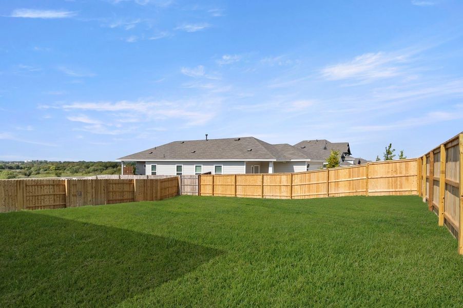 Exterior details and patio area of a home in Cloverleaf, Austin (Image 2).
