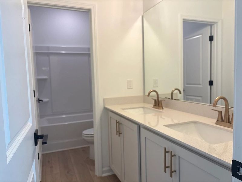 Bath 2 featuring the AW Collection® Serene - Earth-toned surfaces bring warmth and calm.