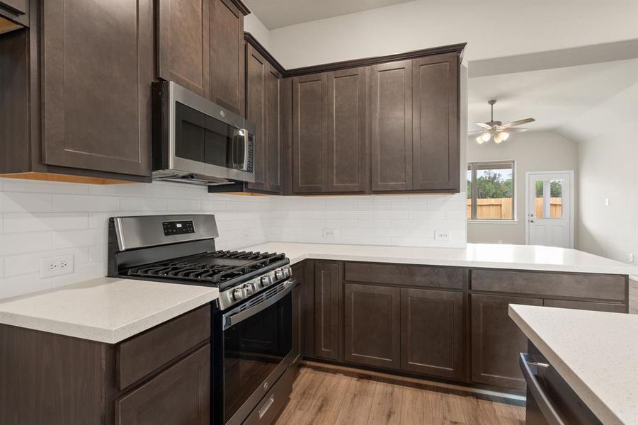 This kitchen is not only a functional space but also has ample storage. Whether you're a seasoned chef or just love to gather and enjoy good food, this kitchen is a dream come true.