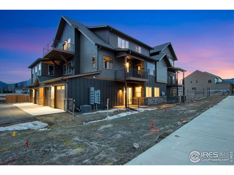 Front exterior of a new home in , Estes Park, CO, highlighting curb appeal (Image 2).