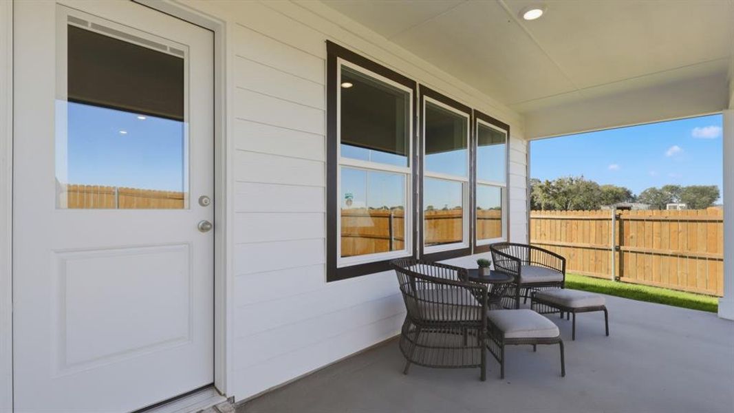 Exterior details and patio area of a home in Townes Landing, Fort Worth (Image 2).