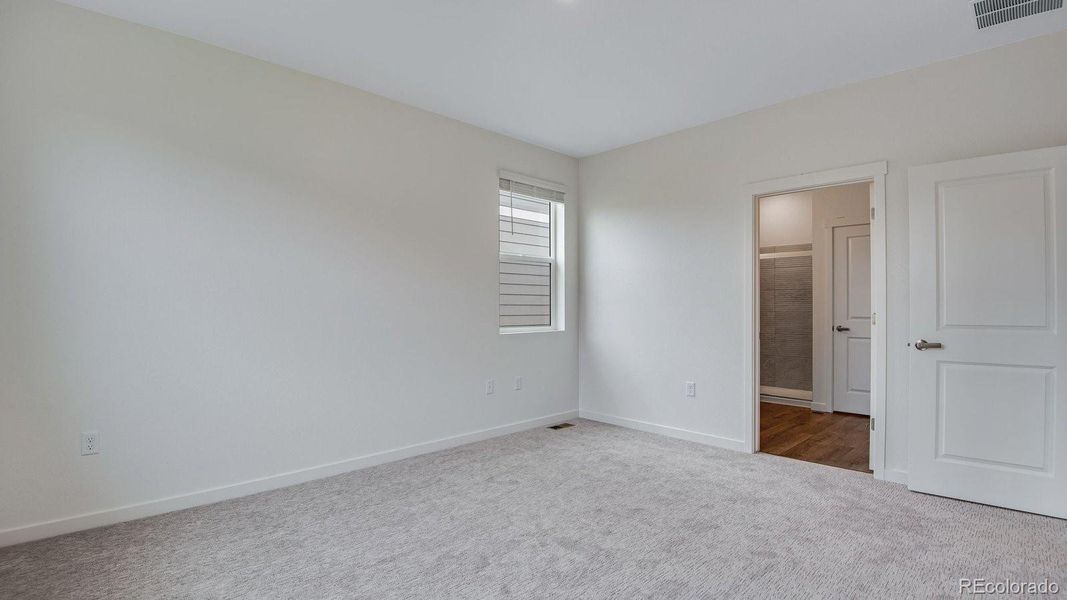 Spacious, unfurnished interior of a new home in Trails at Crowfoot, Parker (Image 34).