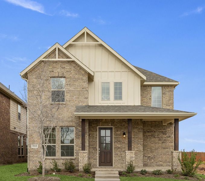 Representative exterior photo of a completed home built from the Magnolia by UnionMain Homes in Edgewater, Fate, TX (Image 1). Representative exterior photo of a completed home built from the Magnolia by UnionMain Homes in Edgewater, Fate, TX (Image 1).