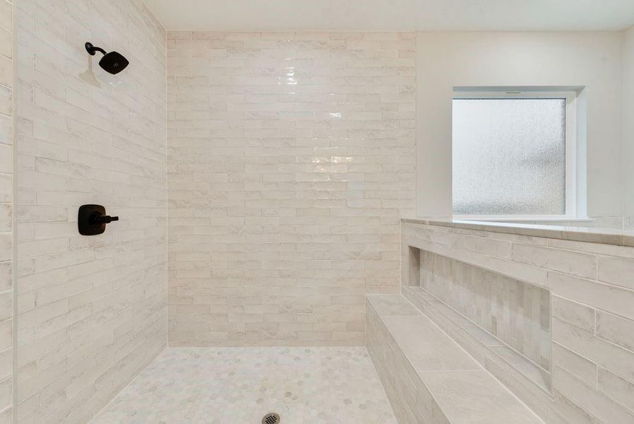 Bathroom with tiled shower