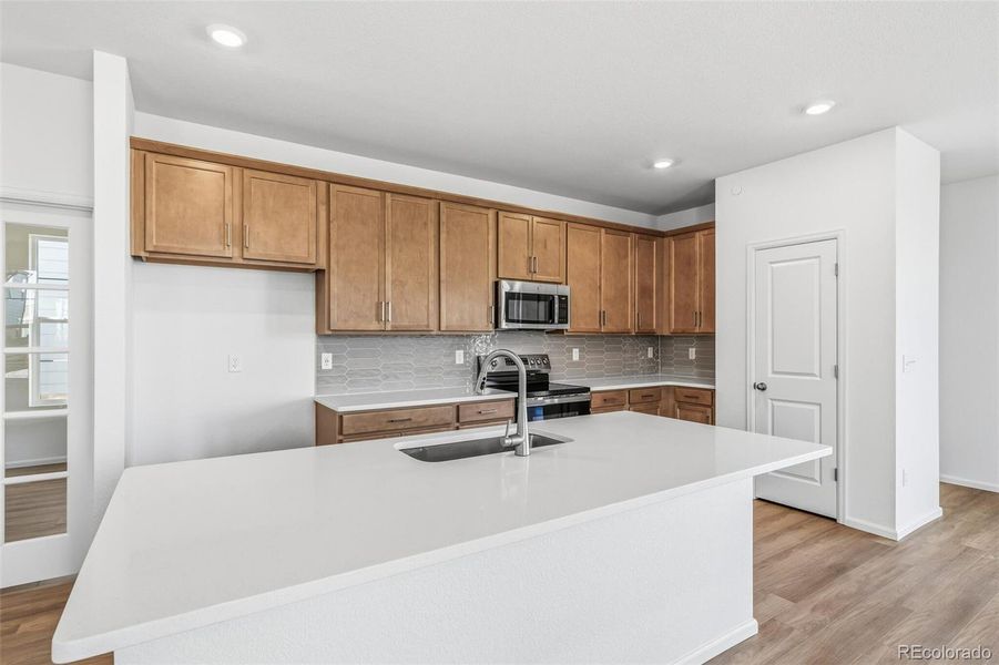 Furnished interior view inside a new home in Legato, Commerce City (Image 13).