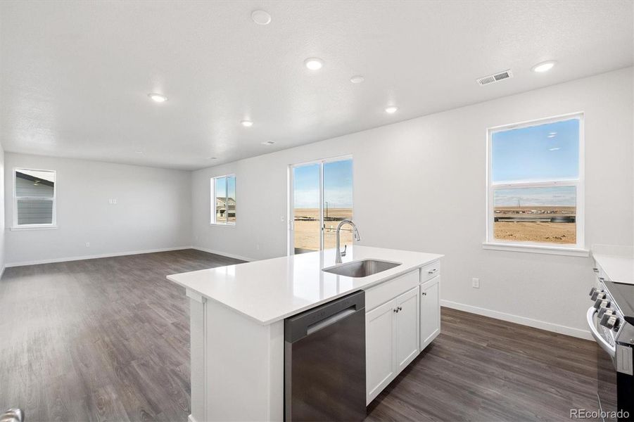 Furnished interior view inside a new home in The Aurora Highlands, Aurora (Image 7).