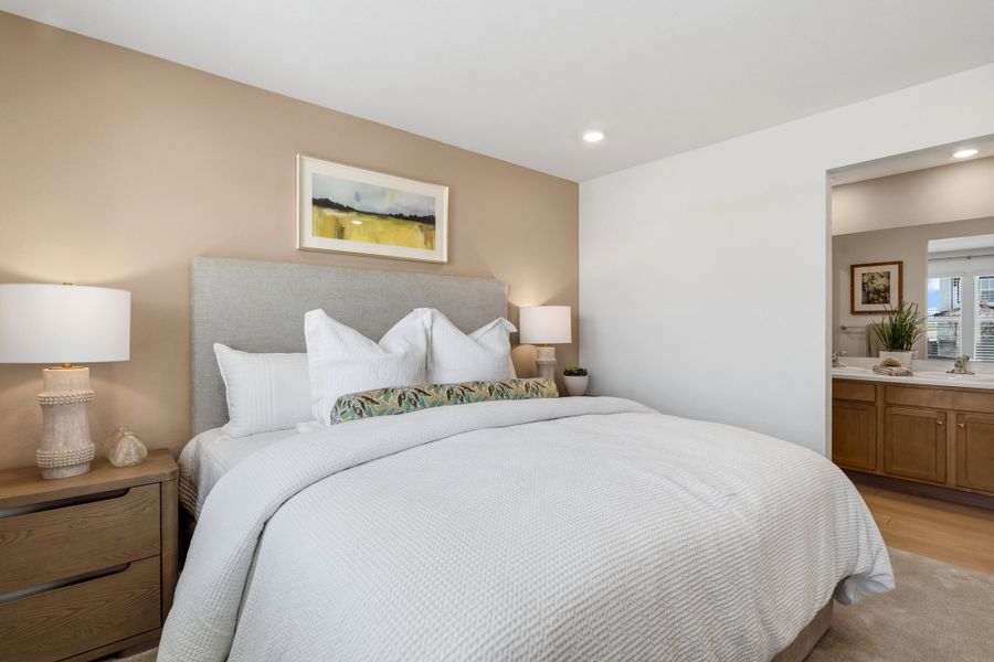 Representative furnished interior of a home built from the 2002 by Risewell Homes in Harvest Crossing, Aurora (Image 15).