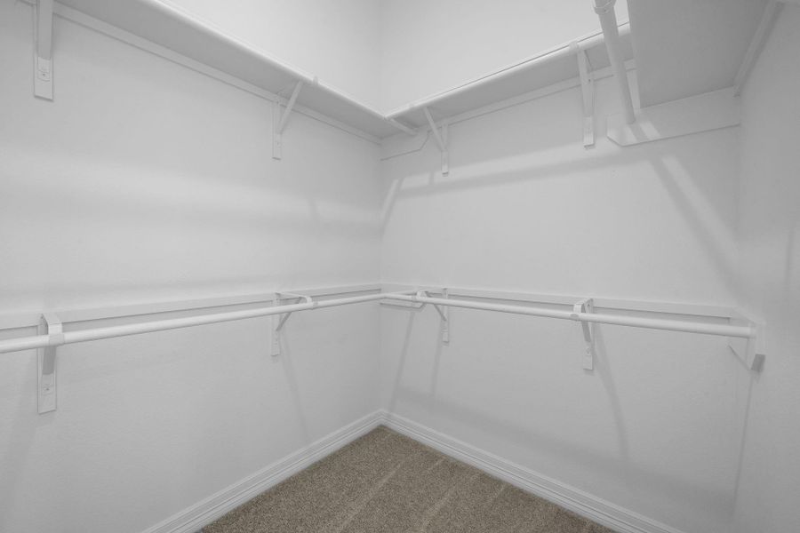 A view of your large primary walk-in Closet A view of your large primary walk-in Closet