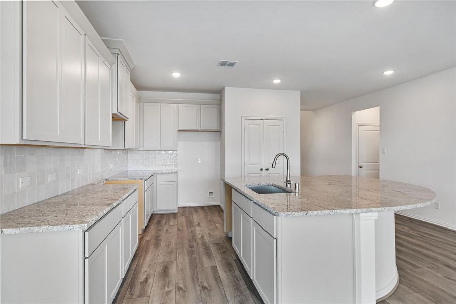 Furnished interior view inside a new home in Aldeana, Bonney (Image 5).