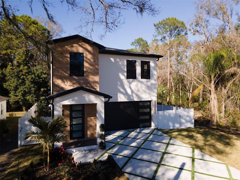 Front exterior of a new home in , Tampa, FL, highlighting curb appeal (Image 30).