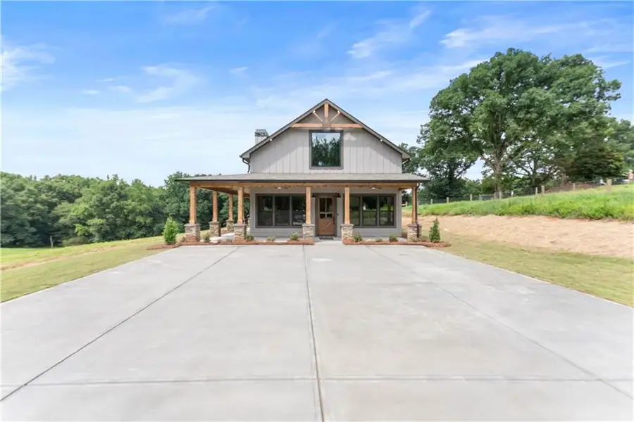 Front exterior of a new home in , Cleveland, GA, highlighting curb appeal (Image 25). Front exterior of a new home in , Cleveland, GA, highlighting curb appeal (Image 25).