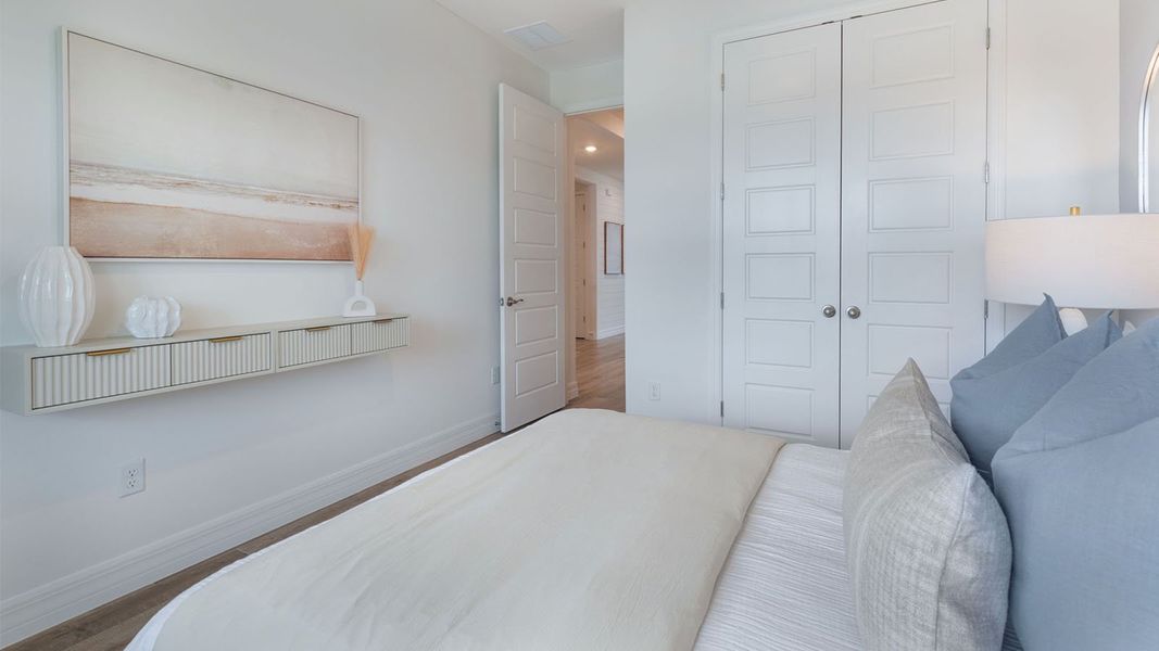 Representative furnished interior of a home built from the DENHAM by D.R. Horton in Lakes of Mount Dora, Mount Dora (Image 29).