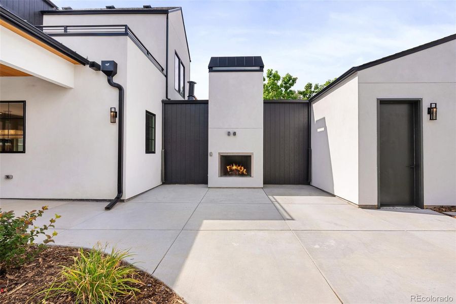 Outdoor fire place, generous space for dining and entertaining