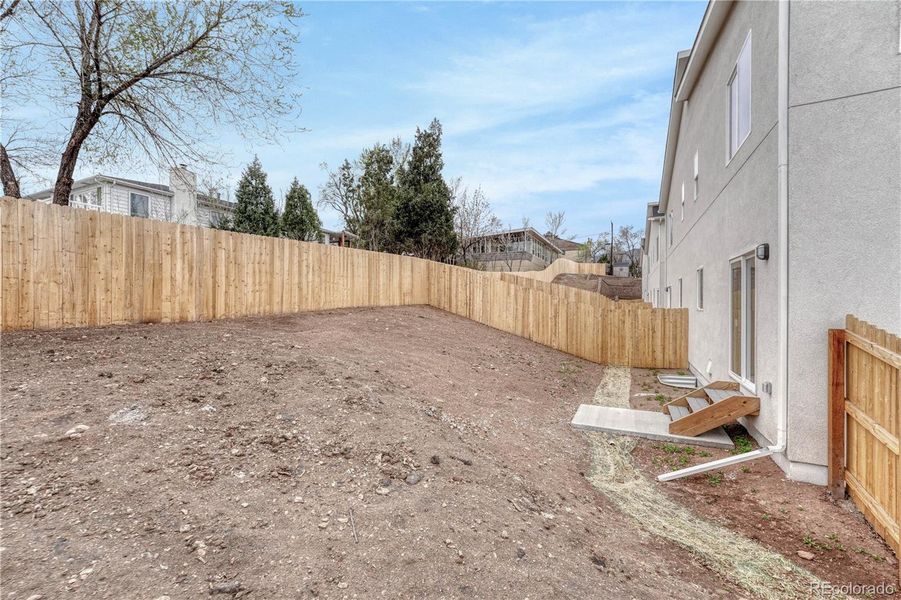 Front exterior of a new home in , Colorado Springs, CO, highlighting curb appeal (Image 22). Front exterior of a new home in , Colorado Springs, CO, highlighting curb appeal (Image 22).
