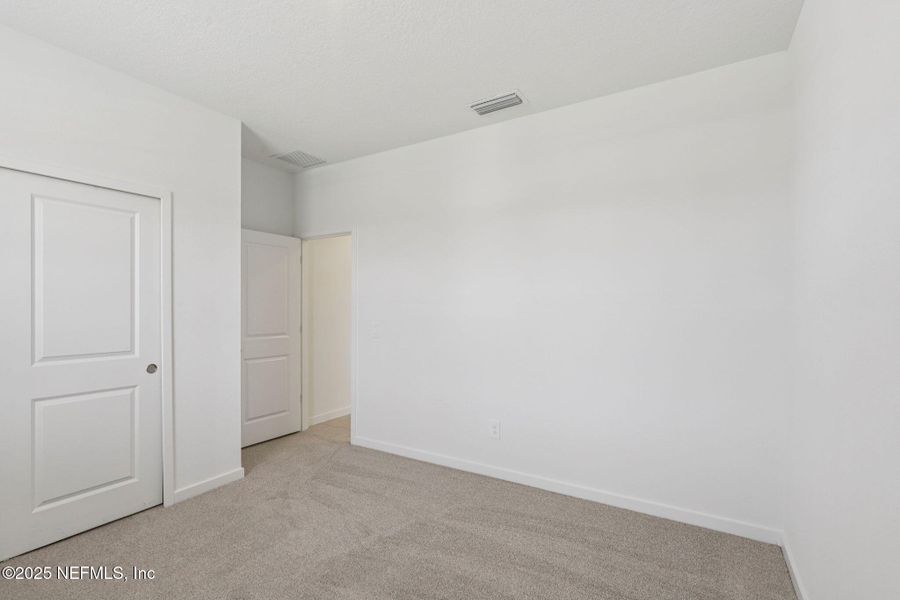 Spacious, unfurnished interior of a new home in Flagler Village - Signature Series, Palm Coast (Image 24).