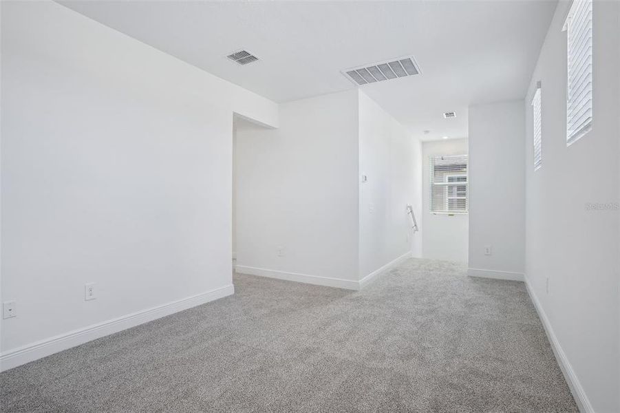 Spacious, unfurnished interior of a new home in Cyrene at Minneola - Villas, Montverde (Image 12). Spacious, unfurnished interior of a new home in Cyrene at Minneola - Villas, Montverde (Image 12).