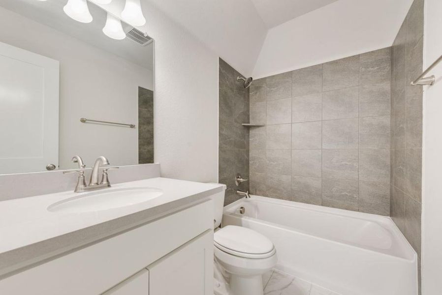 Furnished interior view inside a new home in Dominion of Pleasant Valley, Wylie (Image 18).