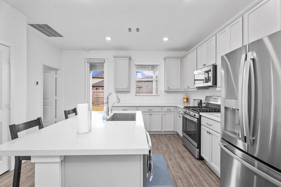 Furnished interior view inside a new home in Mason Woods, Cypress (Image 10).