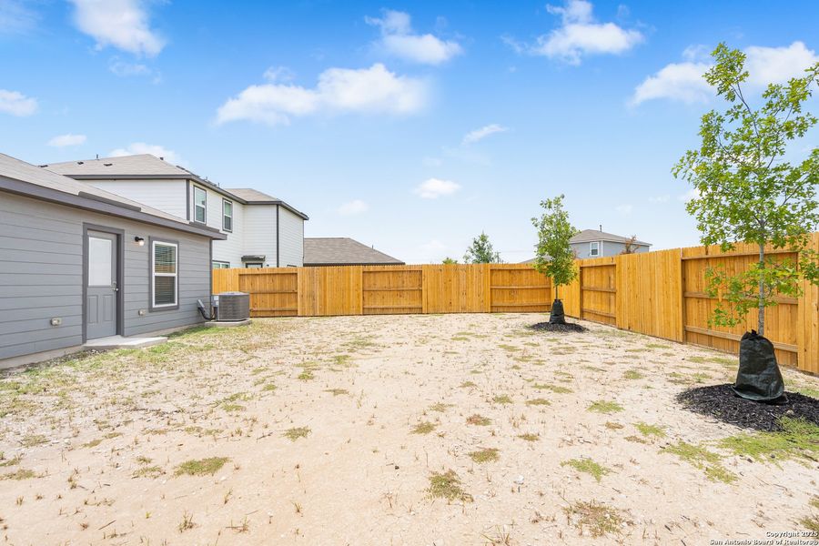 Front exterior of a new home in Luckey Ranch, San Antonio, TX, highlighting curb appeal (Image 2).