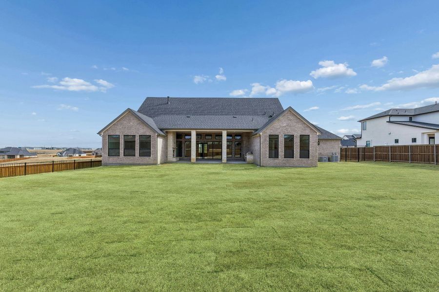 Exterior details and patio area of a home in The Vines, Haslet (Image 25).