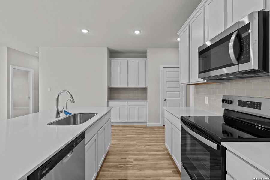 Furnished interior view inside a new home in Cinco Lakes, San Antonio (Image 5).