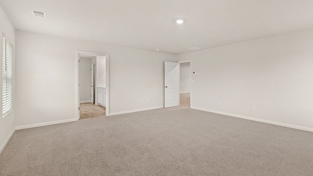 Representative unfurnished interior of a home built from the Mansfield by D.R. Horton in Northwoods at Mirror Lake, Villa Rica (Image 29).
