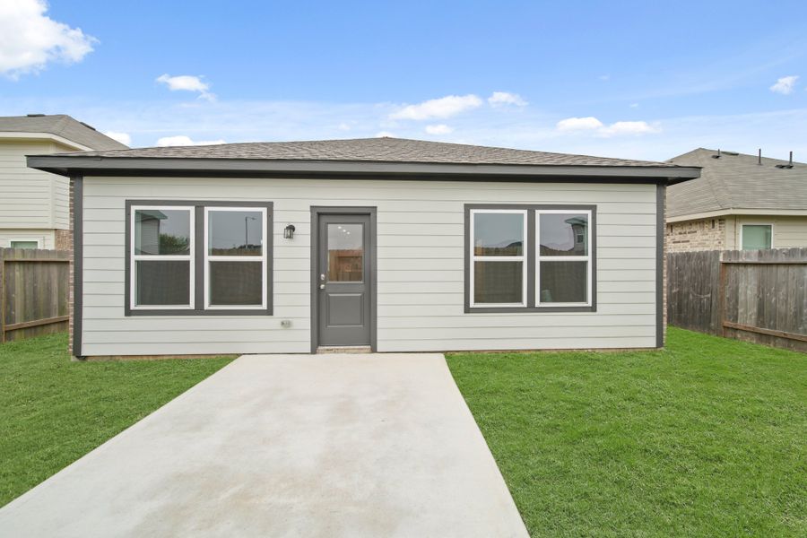 A house with a front yard.