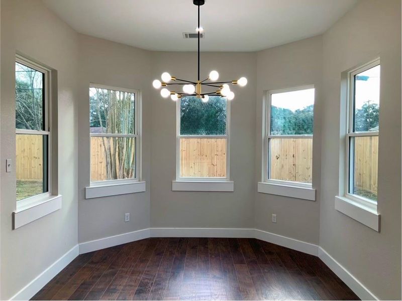 Wow! So much natural lighting with so many gorgeous windows!