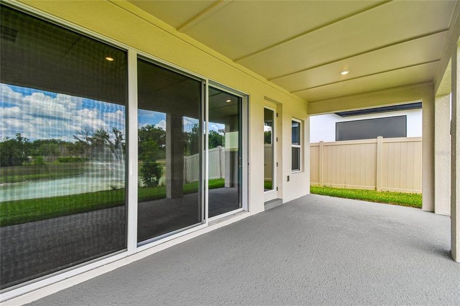 Exterior details and patio area of a home in Oakfield at Mount Dora Village Series, Mount Dora (Image 25).
