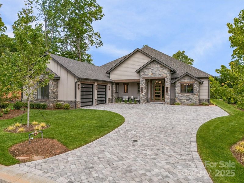 Front exterior of a new home in , Arden, NC, highlighting curb appeal (Image 20). Front exterior of a new home in , Arden, NC, highlighting curb appeal (Image 20).