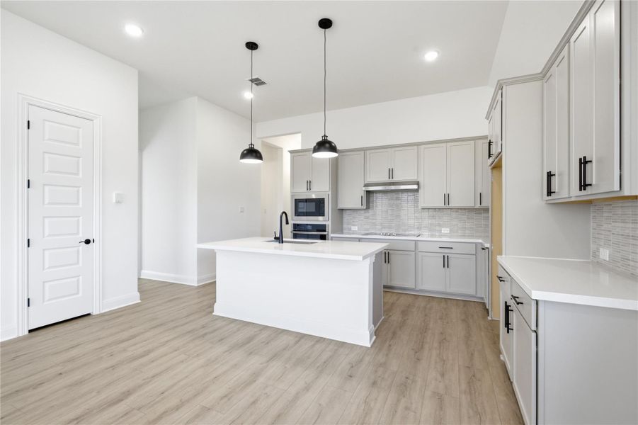 Furnished interior view inside a new home in Oaks at San Gabriel, Georgetown (Image 8).