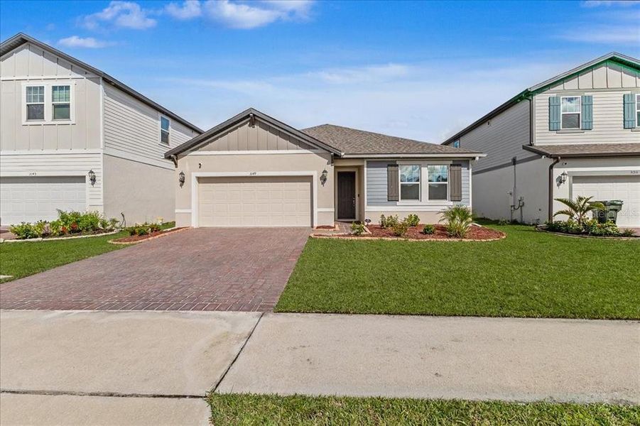 Front exterior of a new home in , Daytona Beach, FL, highlighting curb appeal (Image 24). Front exterior of a new home in , Daytona Beach, FL, highlighting curb appeal (Image 24).