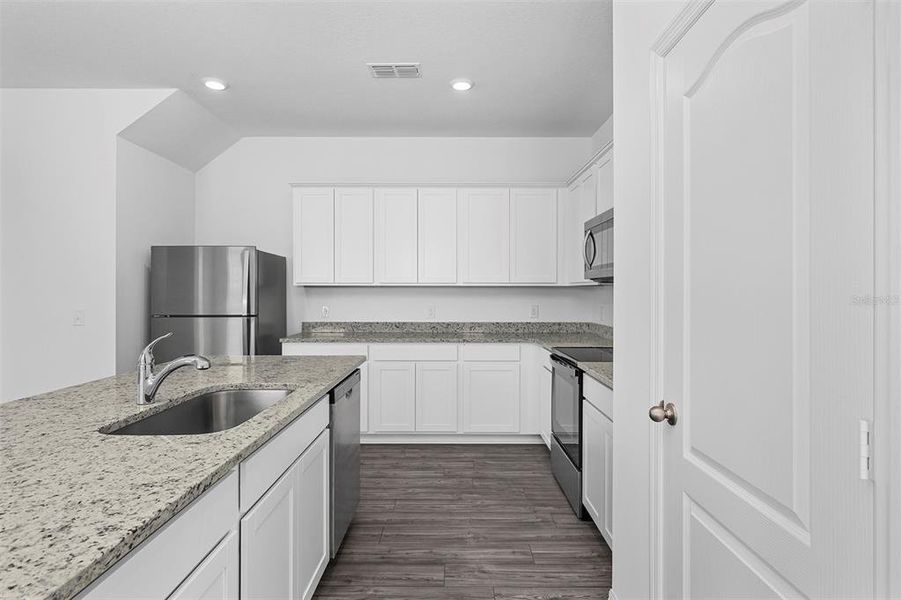 Furnished interior view inside a new home in , Poinciana (Image 4).