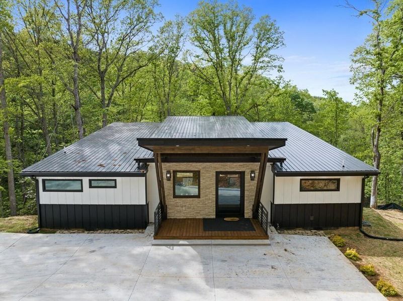 Front exterior of a new home in , Blue Ridge, GA, highlighting curb appeal (Image 24). Front exterior of a new home in , Blue Ridge, GA, highlighting curb appeal (Image 24).