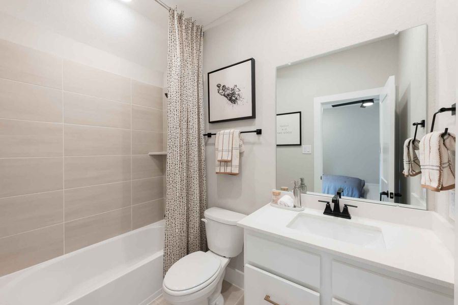 Representative furnished interior of a home built from the Barnhart by Tri Pointe Homes in Amethyst at Azalea Trails, Cypress (Image 47).