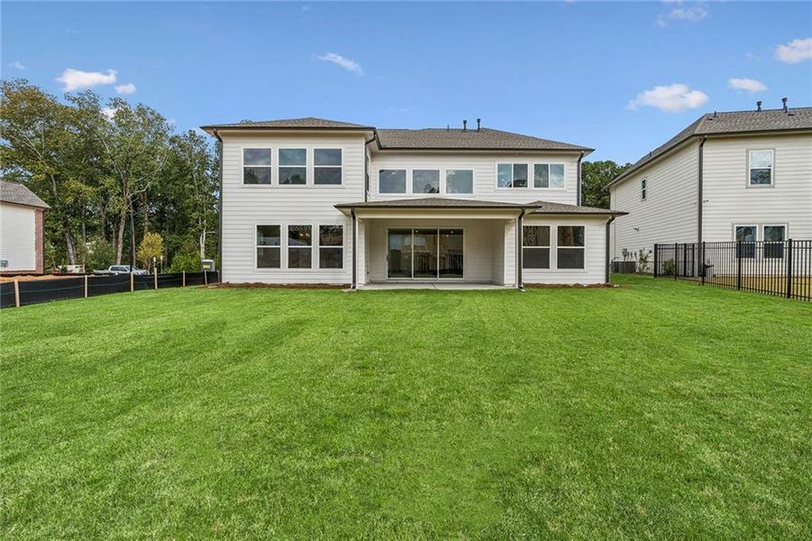 Exterior details and patio area of a home in Havencroft, Woodstock (Image 2). Exterior details and patio area of a home in Havencroft, Woodstock (Image 2).