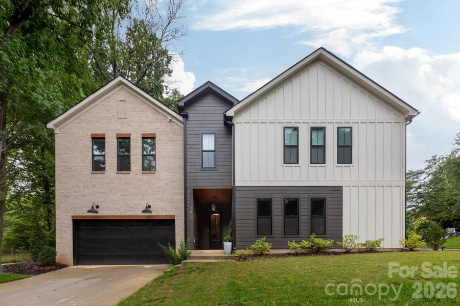 Front exterior of a new home in , Charlotte, NC, highlighting curb appeal (Image 24). Front exterior of a new home in , Charlotte, NC, highlighting curb appeal (Image 24).