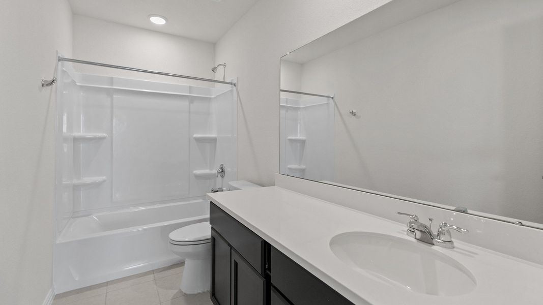 Representative furnished interior of a home built from the Southfork by Brightland Homes in Mostyn Springs, Magnolia (Image 17).