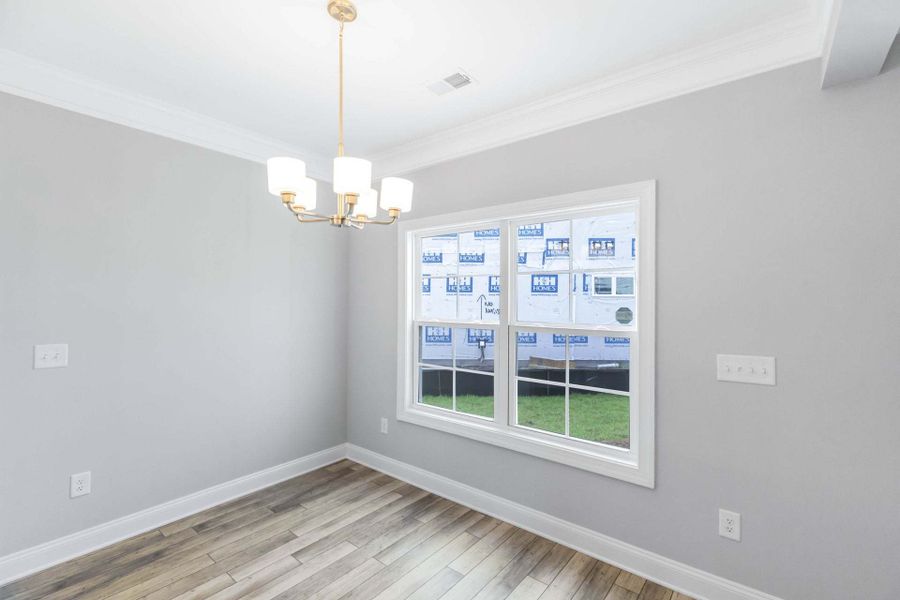 Representative unfurnished interior of a home built from the Clayton by Caviness & Cates Communities in Bartlett Manor, Youngsville (Image 143).