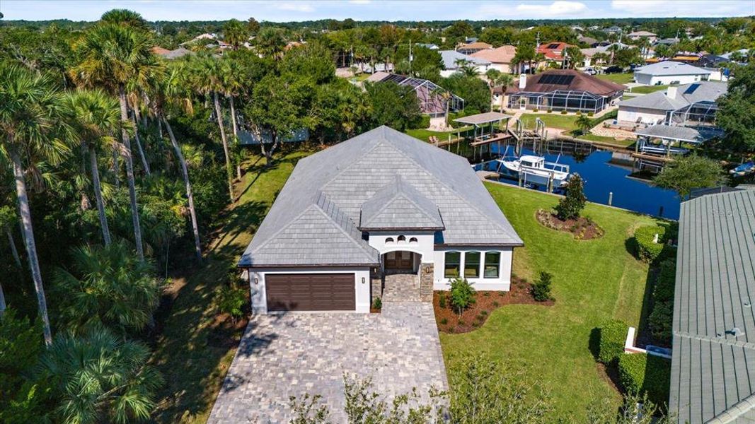 Front exterior of a new home in , Palm Coast, FL, highlighting curb appeal (Image 28).