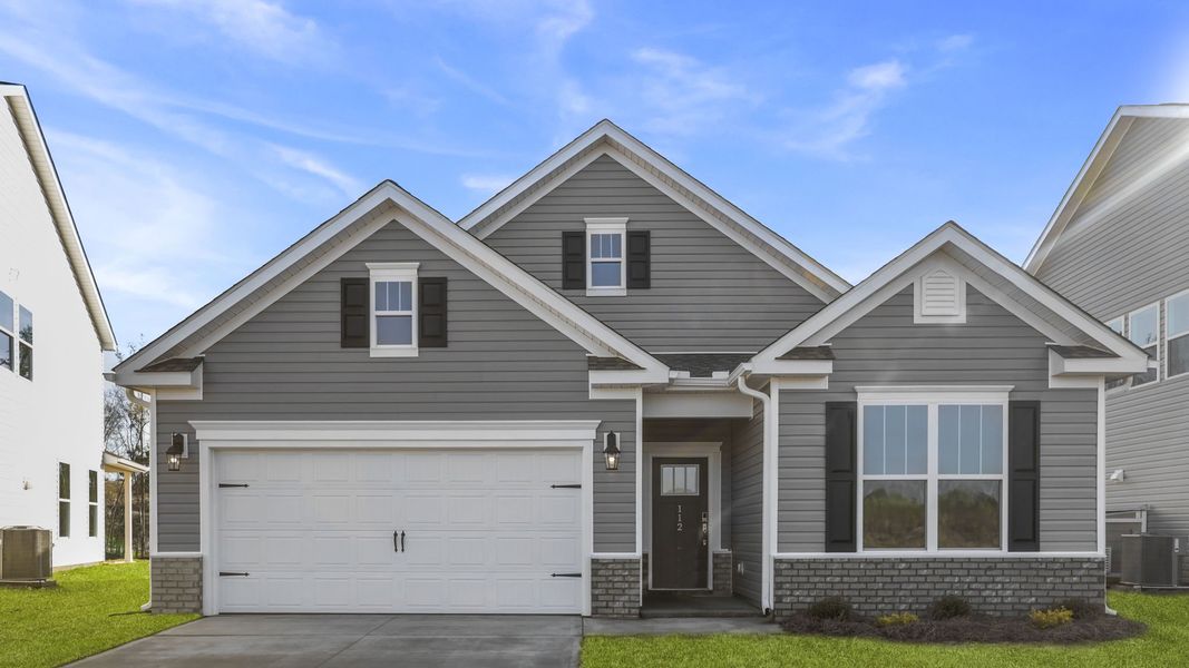 Front exterior of a new home in Seven Oaks, Greenwood, SC, highlighting curb appeal (Image 1). Front exterior of a new home in Seven Oaks, Greenwood, SC, highlighting curb appeal (Image 1).