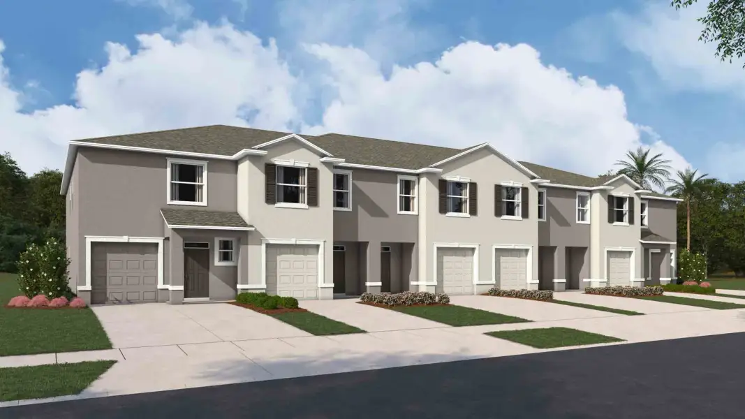 Front exterior of a new home in Towns at Woodsdale, Wesley Chapel, FL, highlighting curb appeal (Image 24).
