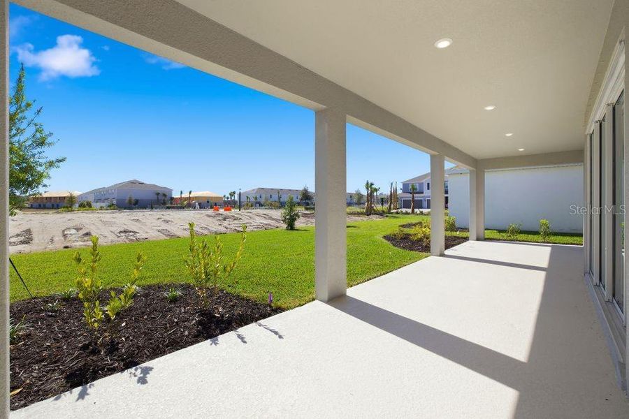 Exterior details and patio area of a home in Firethorn, Parrish (Image 26).