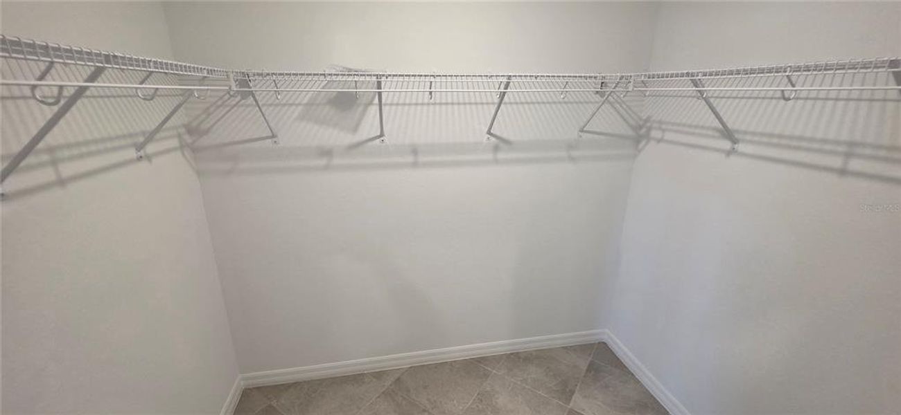 Spacious, unfurnished interior of a new home in Calusa Country Club, Lakewood Ranch (Image 24).