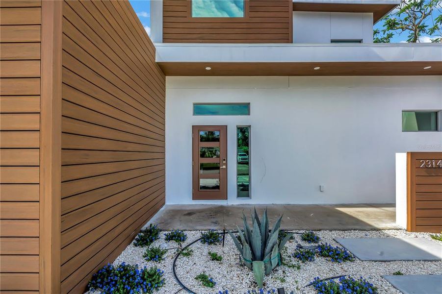 Exterior details and patio area of a home in , Sarasota (Image 26).
